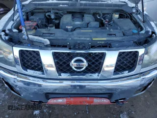 2005 Nissan Titan SE z VIN 1N6AA06B05N561722, wystawiony jako Copart lot #41987285 z przebiegiem 203 558 mil mil oraz Szkoda całkowita • Salvage title. Historia ofert i sprzedaży dostępna na DreamBid. Obrazek 11.