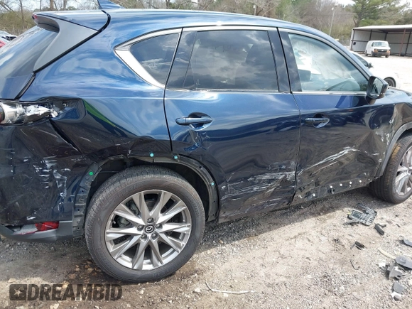2021 Mazda CX-5 Grand Touring with VIN JM3KFBDM8M0484383, listed as a IAAI auction lot 41800786 with 58,617 mi miles. Bid and sale history available at carsss.com. Image 6.