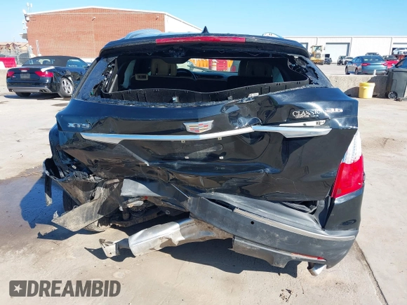 2019 Cadillac XT5 FWD with VIN 1GYKNARS7KZ117913, listed as a IAAI auction lot 41228767 with 105,335 mi miles and . Bid and sale history available at carsss.com. Image 16.