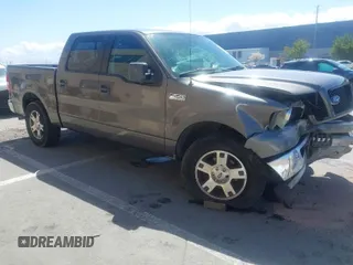 2005 Ford F-150 XLT with VIN 1FTPW12535FA13485, listed as a IAAI auction lot 41949503 with 127,721 mi miles. Bid and sale history available at carsss.com. Image 1.