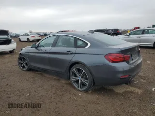 2020 BMW 4 Series 430i xDrive with VIN WBA4J3C00LBL11929, listed as a Copart auction lot 52501055 with 141,791 mi miles and Salvage title. Bid and sale history available at DreamBid. Image 2.