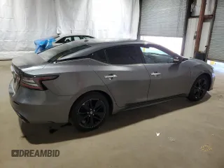2019 Nissan Maxima SV z VIN 1N4AA6AV2KC360313, wystawiony jako Copart lot #52401595 z przebiegiem 67 822 mil mil oraz Czysty tytuł • Clean title. Historia ofert i sprzedaży dostępna na DreamBid. Obrazek 3.