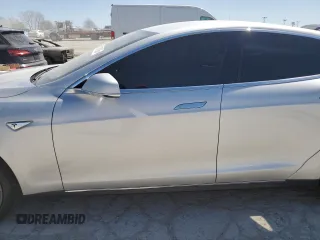 2013 Tesla Model S с VIN 5YJSA1CN5DFP05936, выставлен на аукционе Copart как лот 51831795 с пробегом Не указан миль и Списание • Salvage title. История ставок и продаж доступна на DreamBid. Изображение 7.