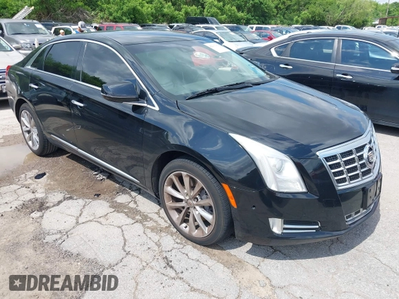 2013 Cadillac XTS Premium with VIN 2G61S5S39D9144177, listed as a IAAI auction lot 42111910 with 69,830 mi miles. Bid and sale history available at carsss.com. Image 1.