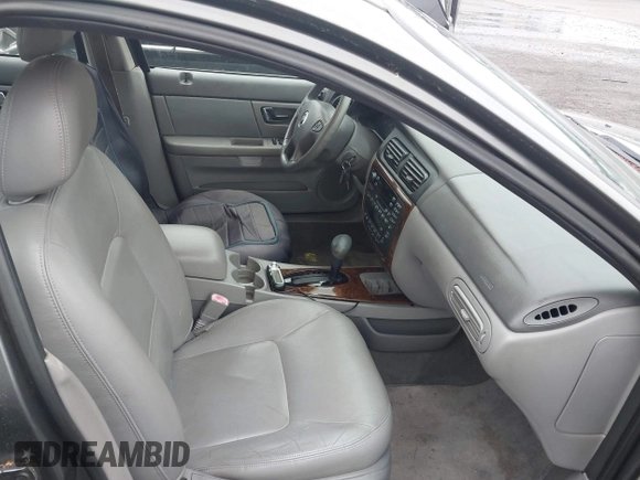 2002 Mercury Sable LS Premium with VIN 1MEFM55S32G620355, listed as a IAAI auction lot 41961390 with 165,204 mi miles and . Bid and sale history available at DreamBid. Image 5.