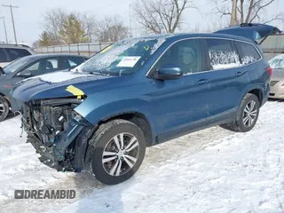 2017 Honda Pilot EX-L with VIN 5FNYF6H55HB005809, listed as a IAAI auction lot 41588106 with 110,197 mi miles and . Bid and sale history available at DreamBid. Image 18.