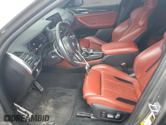 2021 BMW X4 M z VIN 5YMUJ0C03M9F20053, wystawiony jako Copart lot #87595845 z przebiegiem Nie podano mil oraz Szkody całkowita. Historia ofert i sprzedaży dostępna na DreamBid. Obrazek 7.