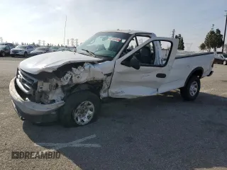 2000 Ford F-150 XL with VIN 1FTPF18L8YKA58312, listed as a Copart auction lot 45748355 with 200,263 mi miles and Salvage title. Bid and sale history available at DreamBid. Image 1.