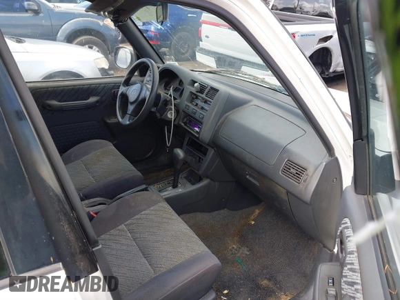 1999 Toyota RAV4 with VIN JT3GP10V9X0041656, listed as a IAAI auction lot 41447012 with 8,845 mi miles and . Bid and sale history available at DreamBid. Image 5.