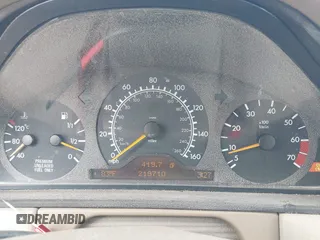 1998 Mercedes-Benz E-Class with VIN WDBJF65FXWA615255, listed as a IAAI auction lot 42146962 with 219,710 mi miles. Bid and sale history available at carsss.com. Image 7.