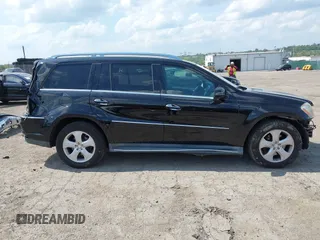 2012 Mercedes-Benz GL 450 z VIN 4JGBF7BE0CA778575, wystawiony jako IAAI lot #42171413 z przebiegiem 59 587 mil mil oraz . Historia ofert i sprzedaży dostępna na DreamBid. Obrazek 14.