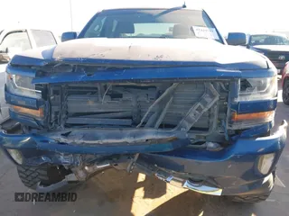 2017 Chevrolet Silverado 1500 LT with VIN 3GCUKREC8HG354004, listed as a IAAI auction lot 41429597 with 77,493 mi miles and . Bid and sale history available at DreamBid. Image 12.