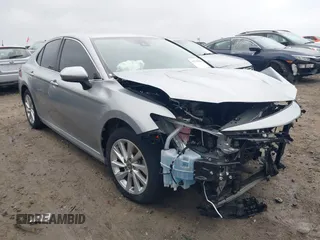 2023 Toyota Camry LE z VIN 4T1C11AK1PU744396, wystawiony jako IAAI lot #41730306 z przebiegiem 40 414 mil mil oraz . Historia ofert i sprzedaży dostępna na DreamBid. Obrazek 1.