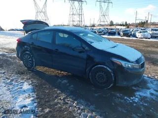 2017 Kia Forte LX with VIN 3KPFK4A72HE029171, listed as a IAAI auction lot 41252277 with 141,392 mi miles. Bid and sale history available at carsss.com. Image 1.