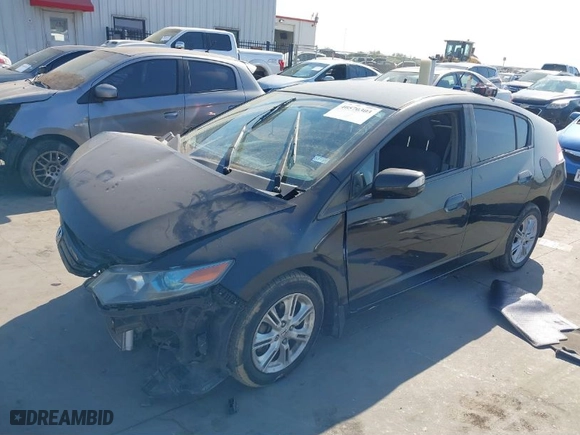 2010 Honda Insight EX with VIN JHMZE2H74AS036557, listed as a IAAI auction lot 41280150 with 110,310 mi miles. Bid and sale history available at carsss.com. Image 2.