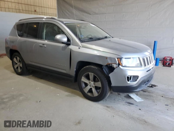 2017 Jeep Compass Latitude with VIN 1C4NJDEB4HD128749, listed as a Copart auction lot 53892245 with 123,549 mi miles and Salvage title. Bid and sale history available at DreamBid. Image 4.