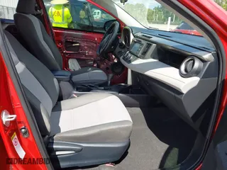 2014 Toyota RAV4 LE with VIN JTMZFREV4EJ005203, listed as a IAAI auction lot 42022295 with 130,193 mi miles. Bid and sale history available at carsss.com. Image 5.