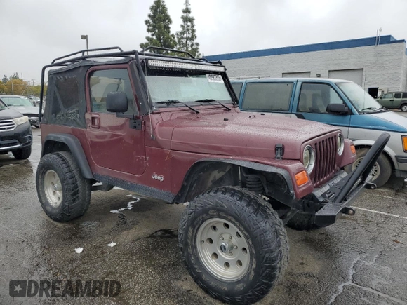 2001 Jeep Wrangler SE with VIN 1J4FA29P61P303287, listed as a Copart auction lot 48583385 with 162,447 mi miles and Salvage Title. Bid and sale history available at carsss.com. Image 4.