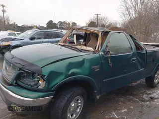 1999 Ford F-150 XL with VIN 1FTRX18L9XNA66552, listed as a IAAI auction lot 41284259 with Not provided miles and . Bid and sale history available at DreamBid. Image 6.