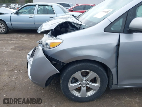 2015 Toyota Sienna LE AAS with VIN 5TDKK3DC1FS551231, listed as a IAAI auction lot 41991035 with 115,149 mi miles and . Bid and sale history available at DreamBid. Image 18.