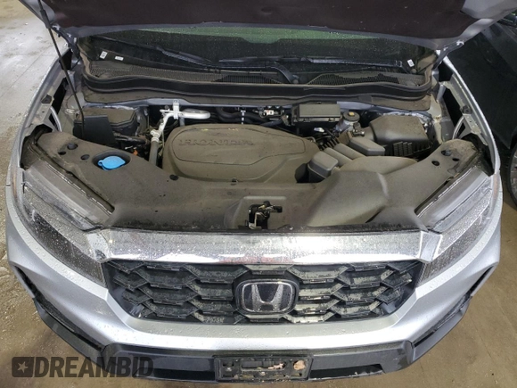 2024 Honda Passport EX-L z VIN 5FNYF8H55RB019867, wystawiony jako Copart lot #50025235 z przebiegiem 17 636 mil mil oraz Czysty tytuł • Clean title. Historia ofert i sprzedaży dostępna na DreamBid. Obrazek 12.