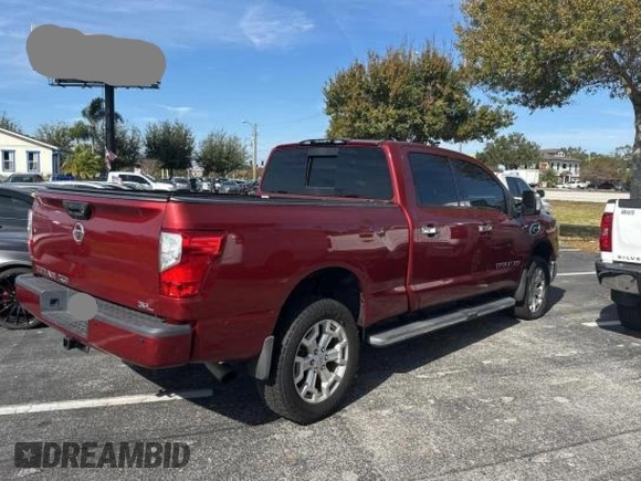 2016 Nissan Titan Platinum Reserve z VIN 1N6BA1F26GN512666, wystawiony jako Copart lot #84673544 z przebiegiem 120 182 mil mil oraz Czysty tytuł • Clean title. Historia ofert i sprzedaży dostępna na DreamBid. Obrazek 4.