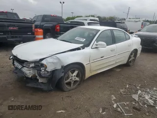 2000 Pontiac Grand Am GT with VIN 1G2NW52E2YM785155, listed as a Copart auction lot 54650275 with 210,046 mi miles and Salvage title. Bid and sale history available at DreamBid. Image 1.