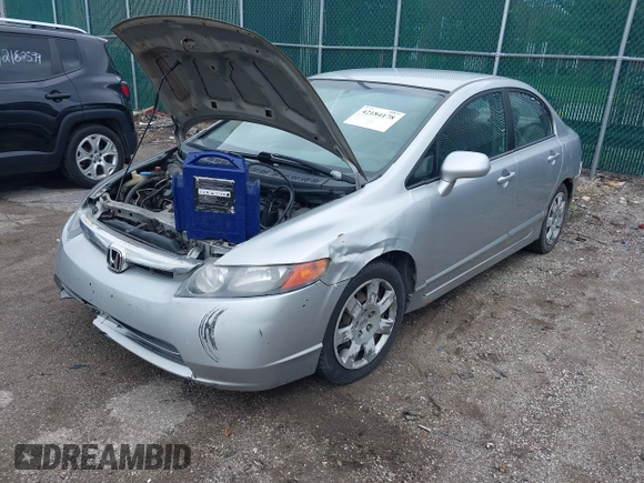 2006 Honda Civic LX z VIN 1HGFA16596L032275, wystawiony jako IAAI lot #42184178 z przebiegiem 220 657 mil mil oraz . Historia ofert i sprzedaży dostępna na DreamBid. Obrazek 2.