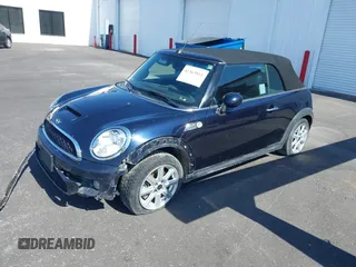 2014 MINI Convertible S z VIN WMWZP3C53ET706796, wystawiony jako IAAI lot #42363811 z przebiegiem 93 581 mil mil oraz . Historia ofert i sprzedaży dostępna na DreamBid. Obrazek 19.