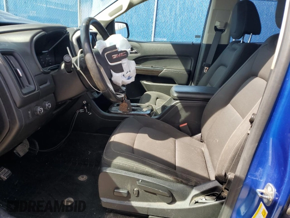 2018 GMC Canyon 4WD SLE z VIN 1GTG6CEN0J1262745, wystawiony jako Copart lot #54671585 z przebiegiem Nie podano mil oraz Szkoda całkowita • Salvage title. Historia ofert i sprzedaży dostępna na DreamBid. Obrazek 7.