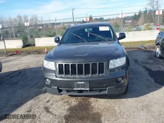 2011 Jeep Grand Cherokee Laredo with VIN 1J4RR4GG2BC670264, listed as a IAAI auction lot 41670045 with 252,044 mi miles. Bid and sale history available at carsss.com. Image 12.