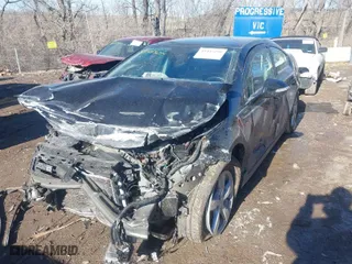 2014 Chevrolet Volt with VIN 1G1RA6E40EU148810, listed as a IAAI auction lot 41457295 with 90,972 mi miles. Bid and sale history available at carsss.com. Image 2.