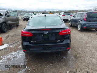 2016 Ford Focus SE with VIN 1FADP3F26GL280805, listed as a IAAI auction lot 42031492 with 146,986 mi miles. Bid and sale history available at carsss.com. Image 16.