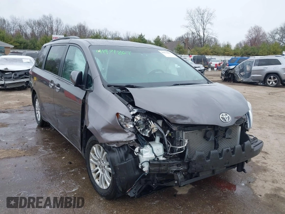 2015 Toyota Sienna XLE with VIN 5TDYK3DC8FS651580, listed as a IAAI auction lot 41971867 with 49,711 mi miles. Bid and sale history available at carsss.com. Image 6.
