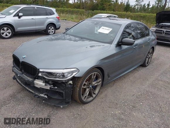 2019 BMW 5 Series M550i xDrive with VIN WBAJB9C57KB289439, listed as a IAAI auction lot 40634389 with 85,992 mi miles and . Bid and sale history available at DreamBid. Image 18.