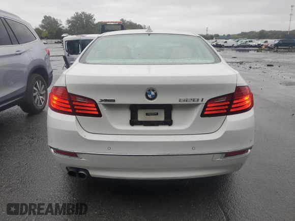 2014 BMW 5 Series 528i xDrive with VIN WBA5A7C52ED614418, listed as a Copart auction lot 68406324 with 139,548 mi miles and Salvage Title. Bid and sale history available at carsss.com. Image 6.