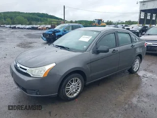2009 Ford Focus SE z VIN 1FAHP35N29W219255, wystawiony jako IAAI lot #42323041 z przebiegiem 158 233 mil mil oraz . Historia ofert i sprzedaży dostępna na DreamBid. Obrazek 2.