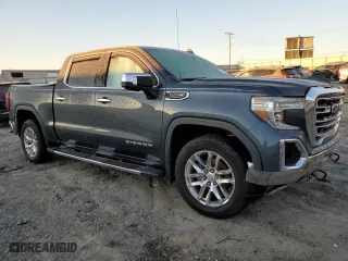 2019 GMC Sierra 1500 SLT with VIN 1GTU9DEDXKZ184405, listed as a Copart auction lot 45329495 with 144,861 mi miles and Salvage Title. Bid and sale history available at carsss.com. Image 4.