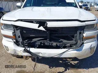 2018 Chevrolet Silverado 1500 LT with VIN 3GCUKREC3JG504431, listed as a IAAI auction lot 41609921 with 192,742 mi miles. Bid and sale history available at carsss.com. Image 6.