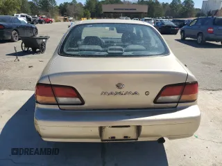 1997 Nissan Maxima GXE z VIN JN1CA21DXVT877062, wystawiony jako Copart lot #49411185 z przebiegiem 249 941 mil mil oraz Szkoda całkowita • Salvage title. Historia ofert i sprzedaży dostępna na DreamBid. Obrazek 6.