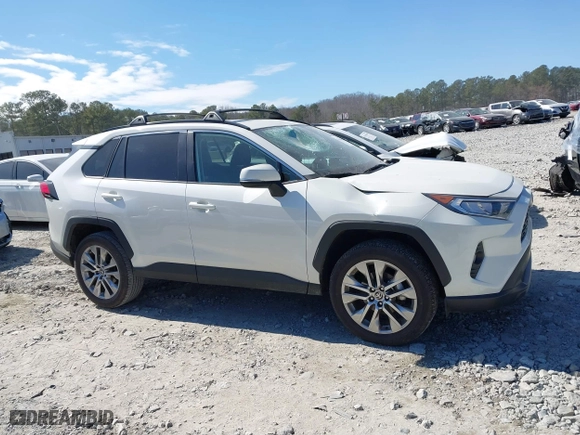 2021 Toyota RAV4 XLE Premium with VIN 2T3C1RFV0MW127432, listed as a IAAI auction lot 41646469 with 28,594 mi miles. Bid and sale history available at carsss.com. Image 13.