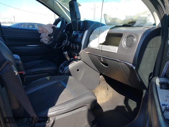 2016 Jeep Compass Latitude with VIN 1C4NJCEB2GD628384, listed as a IAAI auction lot 41752694 with 122,589 mi miles. Bid and sale history available at carsss.com. Image 5.