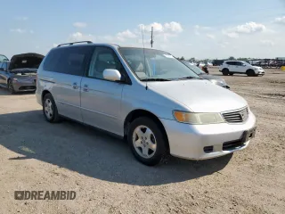 2001 Honda Odyssey EX z VIN 2HKRL18641H619203, wystawiony jako Copart lot #59329555 z przebiegiem 180 058 mil mil oraz Czysty tytuł • Clean title. Historia ofert i sprzedaży dostępna na DreamBid. Obrazek 4.
