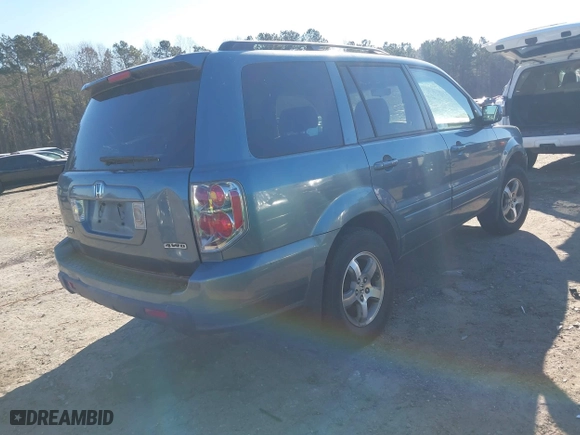 2006 Honda Pilot EX-L with VIN 5FNYF18516B002860, listed as a IAAI auction lot 41355134 with 202,797 mi miles. Bid and sale history available at carsss.com. Image 4.
