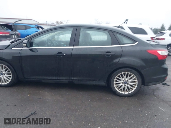 2014 Ford Focus Titanium with VIN 1FADP3J24EL439065, listed as a IAAI auction lot 40868973 with 167,739 mi miles. Bid and sale history available at carsss.com. Image 14.