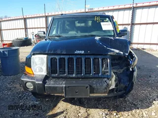 2006 Jeep Commander with VIN 1J8HG48N66C174256, listed as a IAAI auction lot 41652107 with 106,966 mi miles. Bid and sale history available at carsss.com. Image 13.
