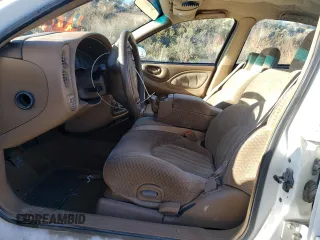 2000 Pontiac Bonneville SE z VIN 1G2HX54K2Y4241848, wystawiony jako Copart lot #80999434 z przebiegiem Nie podano mil oraz Szkoda całkowita • Salvage title. Historia ofert i sprzedaży dostępna na DreamBid. Obrazek 7.