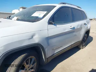 2014 Jeep Cherokee Limited with VIN 1C4PJLDSXEW118473, listed as a IAAI auction lot 41359322 with 111,000 mi miles. Bid and sale history available at carsss.com. Image 6.