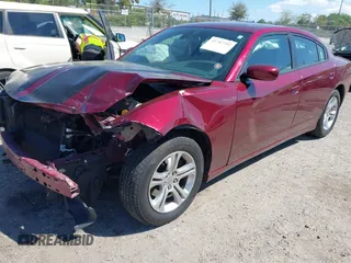 2021 Dodge Charger SXT with VIN 2C3CDXBG7MH543579, listed as a IAAI auction lot 41787297 with 91,472 mi miles and . Bid and sale history available at DreamBid. Image 2.
