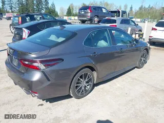 2023 Toyota Camry SE with VIN 4T1G11AKXPU778287, listed as a IAAI auction lot 42041951 with 49,629 mi miles. Bid and sale history available at carsss.com. Image 4.